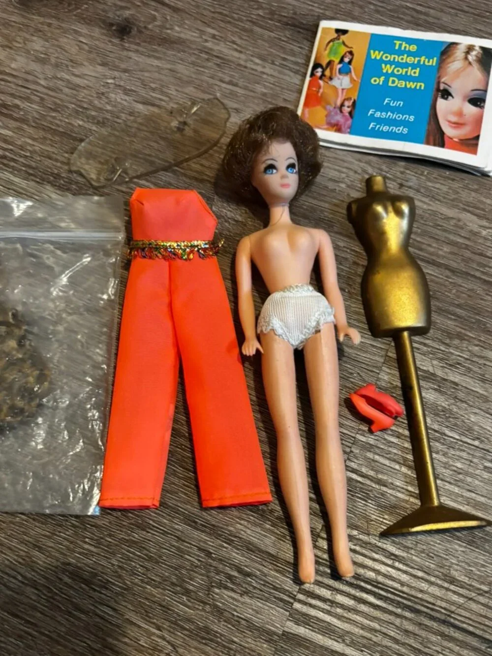 Topper Dawn Head to Toe wearing original orange jumpsuit w/long braid
